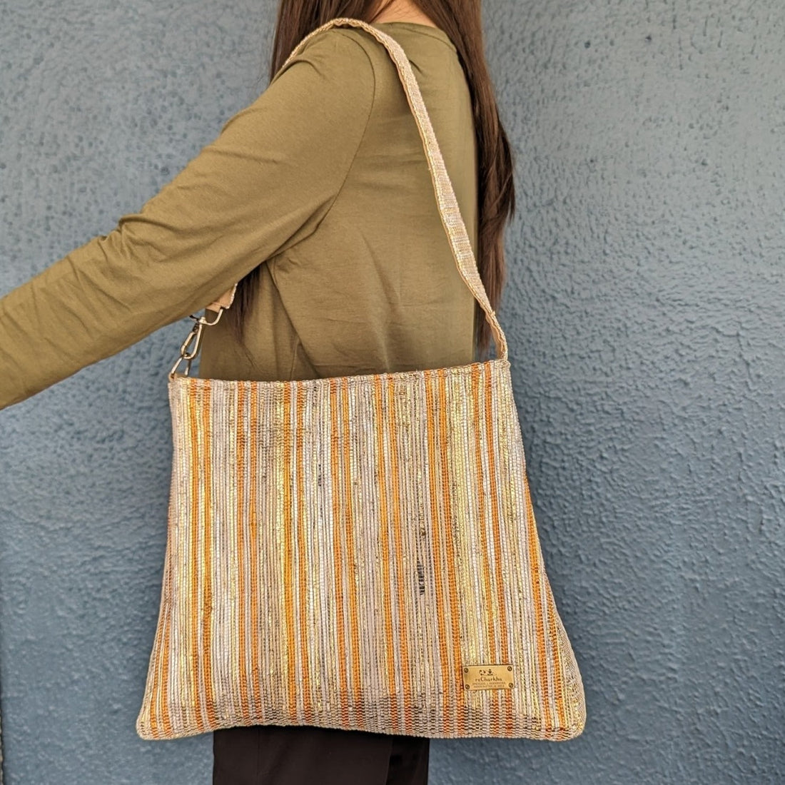 Trapeze Tote (TT0324-102) Orange and Glittery Golden waste plastic wrappers upcycled handwoven